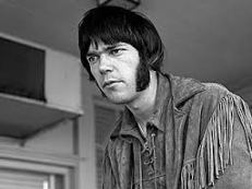 Neil joven con patillas y flecos